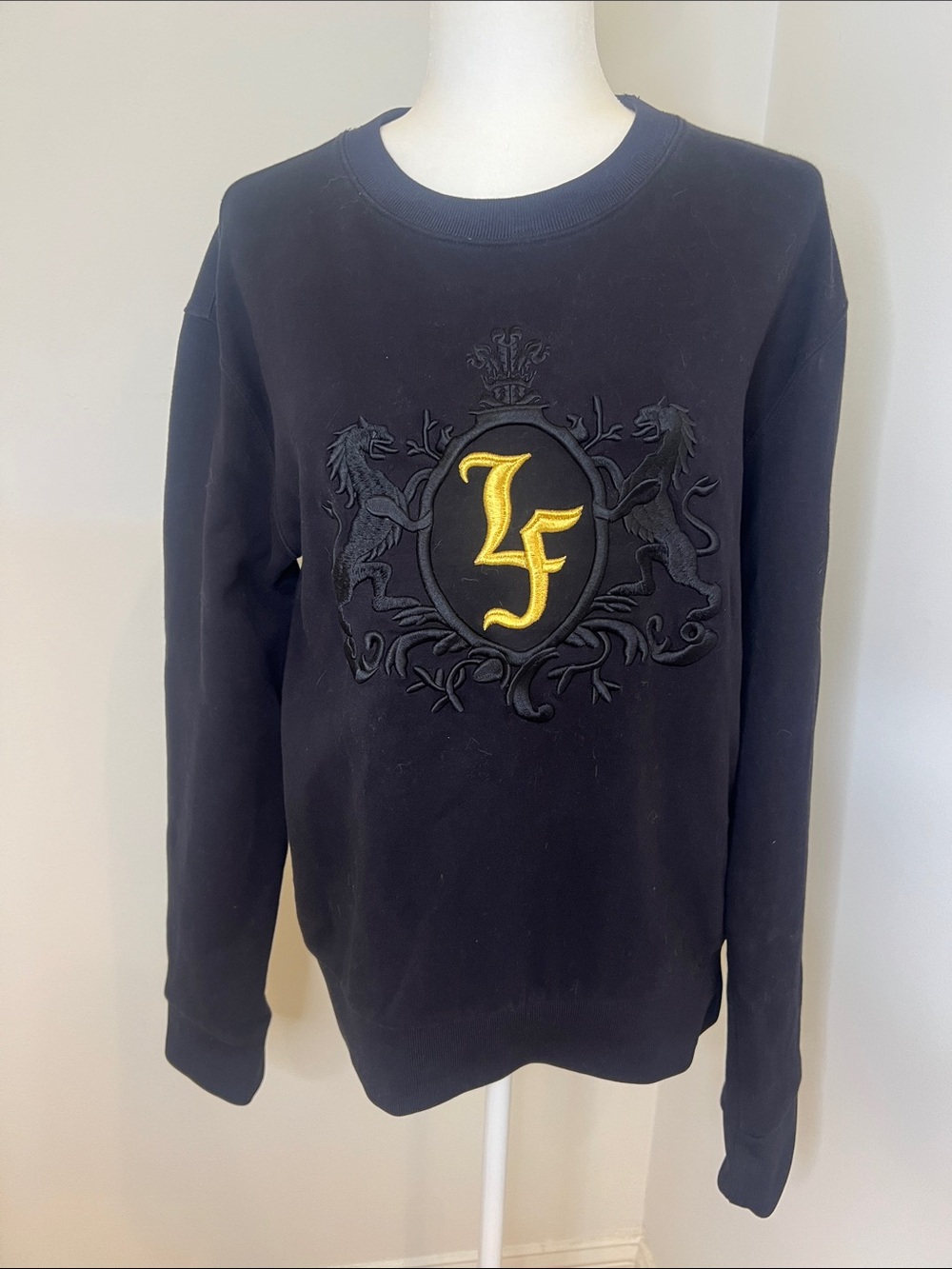 Rare Men's Black Embroidered Crest Sweatshirt with Yellow Accent